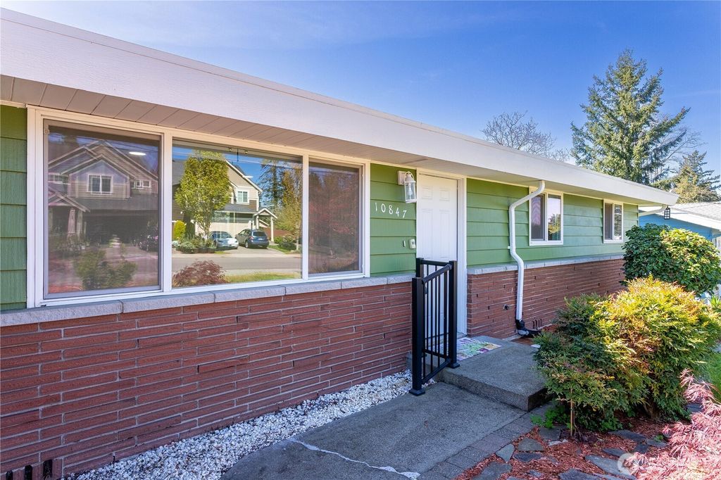 Photo of 10847 SE 218th Street, Kent, WA 98031 (MLS # 2359424)