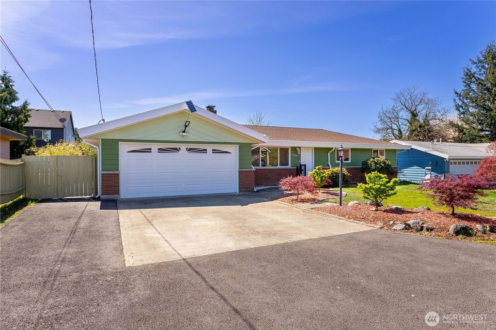 Photo of 10847 SE 218th Street, Kent, WA 98031 (MLS # 2359424)