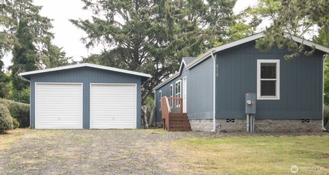 Photo of 810 Magellan Avenue NE, Ocean Shores, WA 98569 (MLS # 2502976)