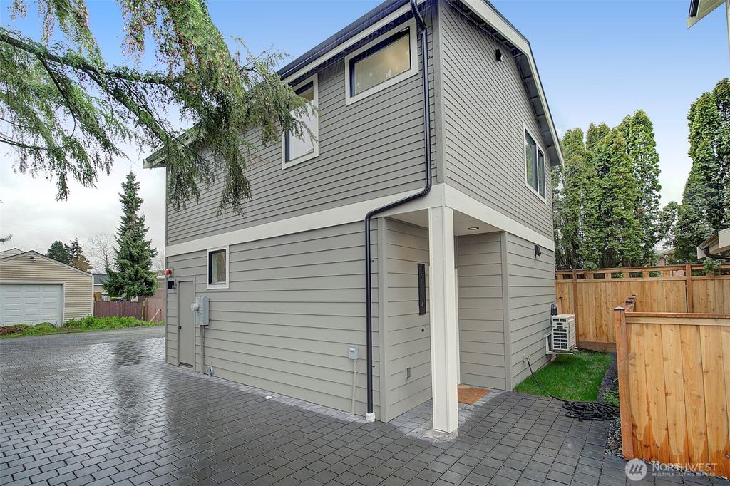 Photo of 10214 40th Avenue SW, Seattle, WA 98146 (MLS # 2358429)