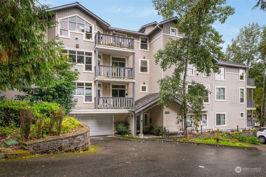 Photo of 11550 Stone Avenue N #103, Seattle, WA 98133 (MLS # 2311700)