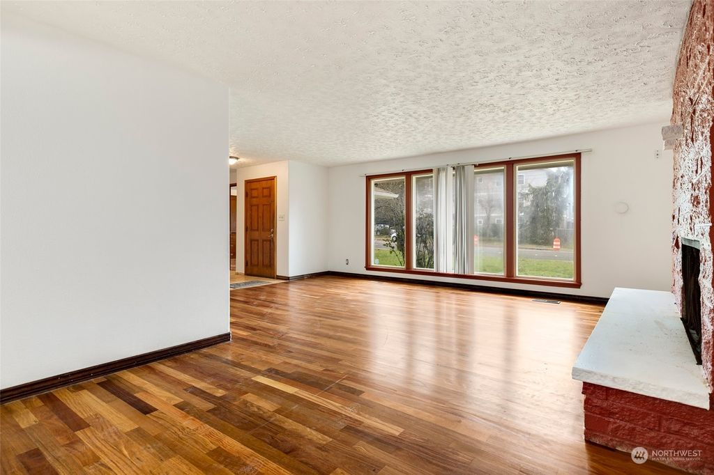 Photo of 3210 S 208th Street, SeaTac, WA 98198 (MLS # 2197051)