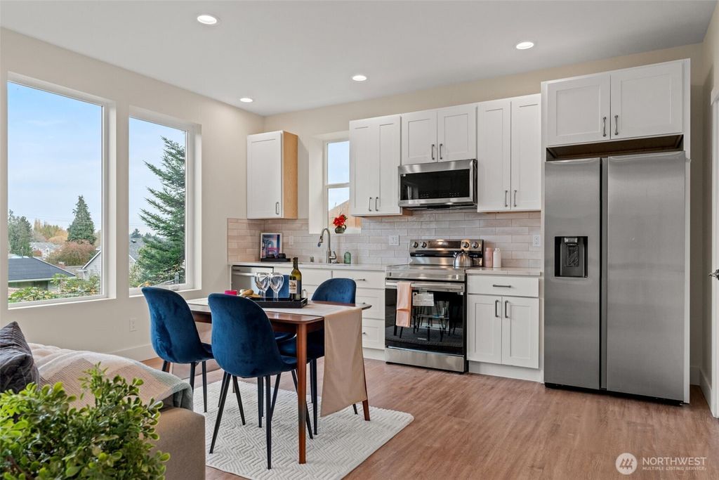 Photo of 8610 37th Avenue S, Seattle, WA 98118 (MLS # 2409740)