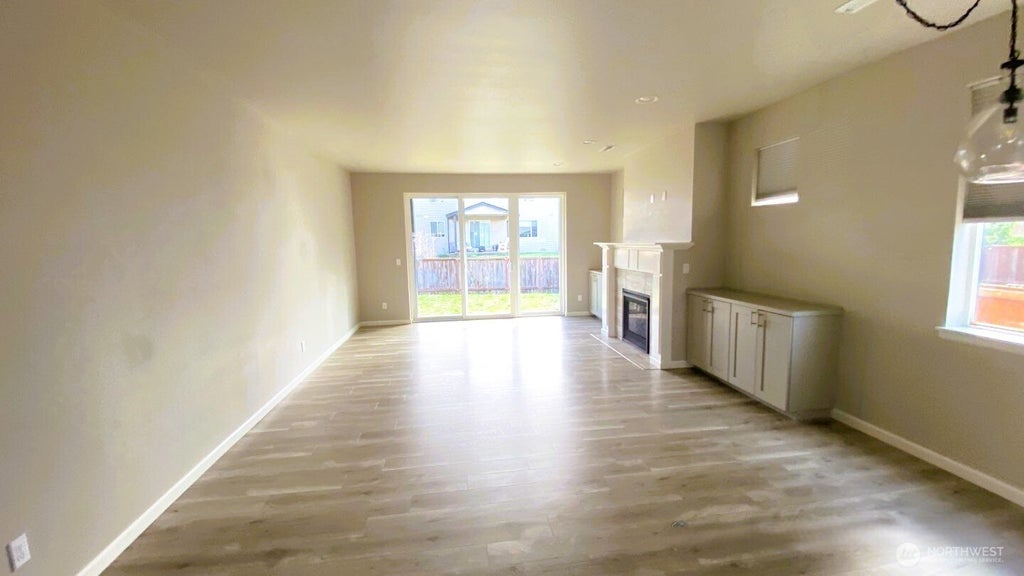Photo of 410 Buell Street SW, Orting, WA 98360 (MLS # 2588479)