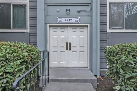 Photo of 4737 W Lake Sammamish Parkway SE #A108, Issaquah, WA 98027 (MLS # 2455056)