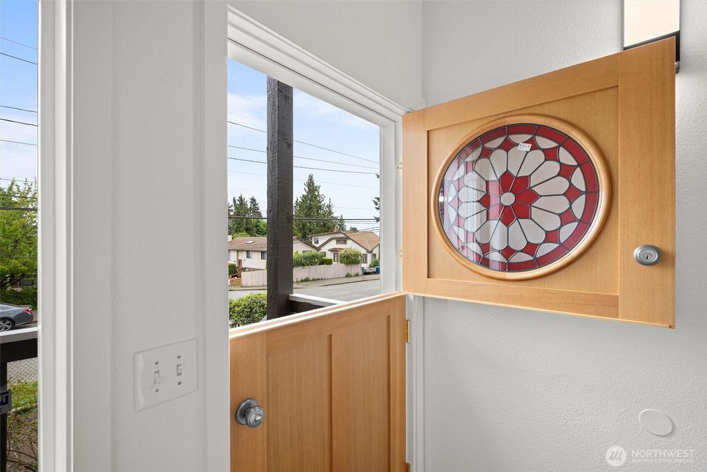 Photo of 8803 15th Avenue NE, Seattle, WA 98115 (MLS # 2524199)