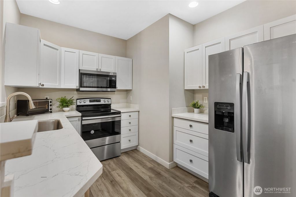 Photo of 12712 Admiralty Way #F104, Everett, WA 98204 (MLS # 2485846)