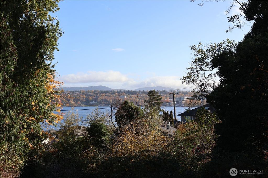 Photo of 11000 Lotus Place S, Seattle, WA 98178 (MLS # 2319061)