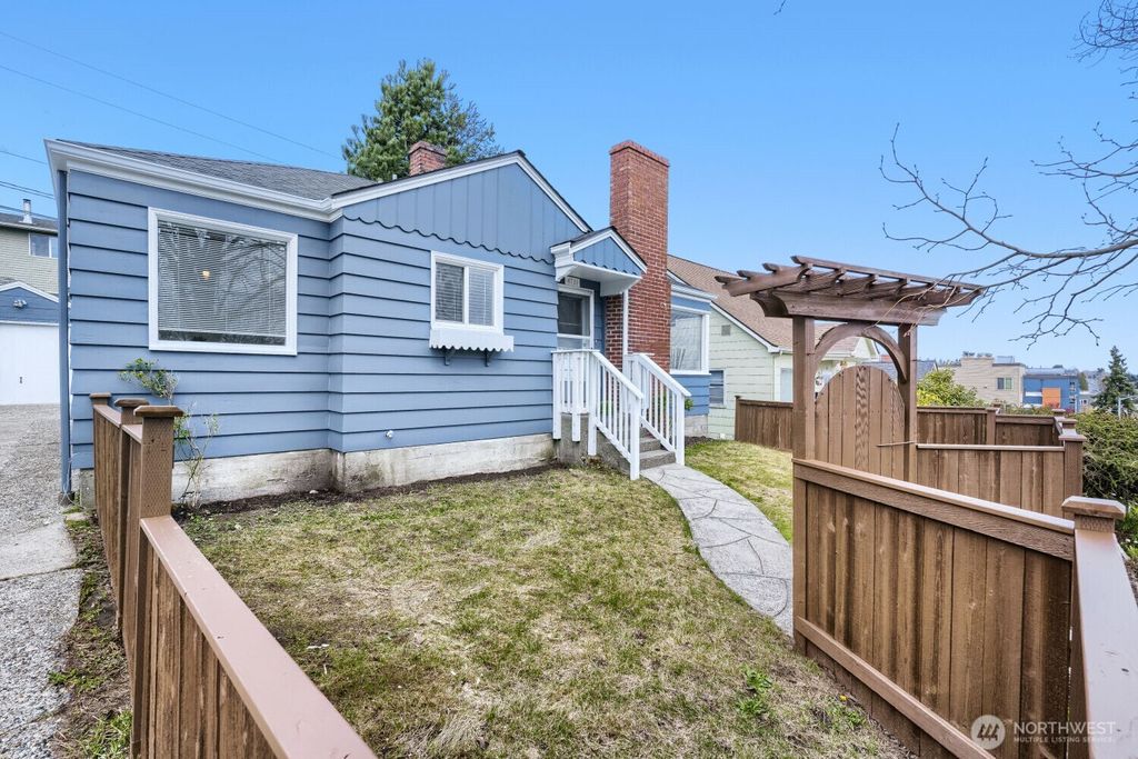 Photo of 4731 35th Avenue SW, Seattle, WA 98126 (MLS # 2502503)