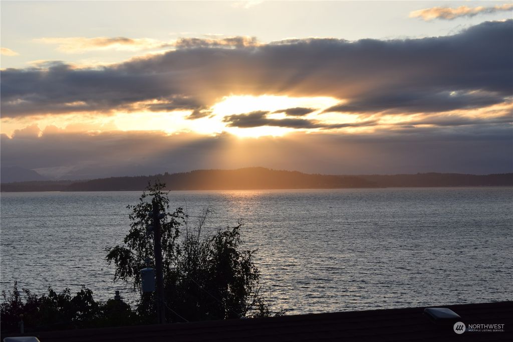 Photo of 5960 Beach Drive SW, Seattle, WA 98136 (MLS # 2126188)