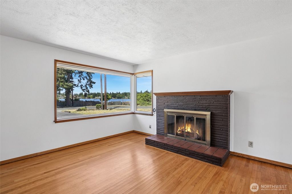 Photo of 15602 12th Avenue SW, Burien, WA 98166 (MLS # 2413318)