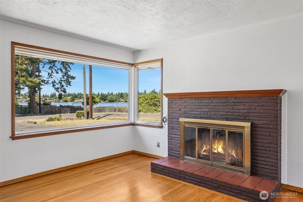 Photo of 15602 12th Avenue SW, Burien, WA 98166 (MLS # 2413318)