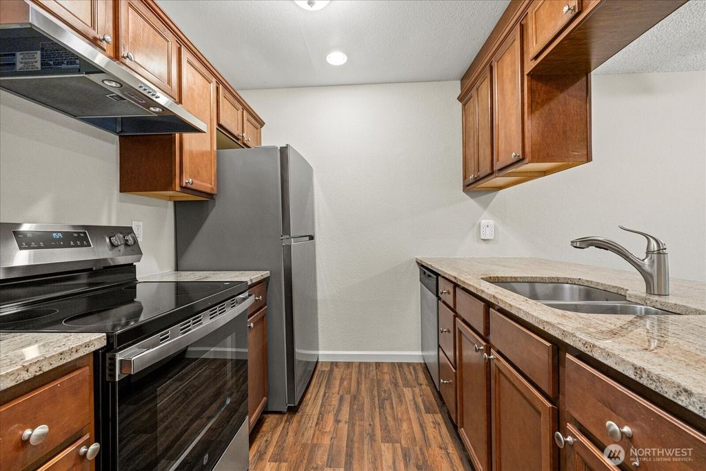 Photo of 3233 NE 12th Street #208, Renton, WA 98056 (MLS # 2418468)