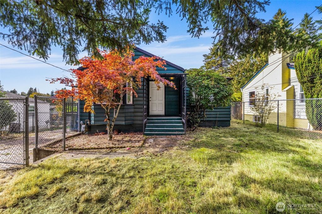 Photo of 10713 15th Ave NE Ave, Seattle, WA 98125 (MLS # 2445339)