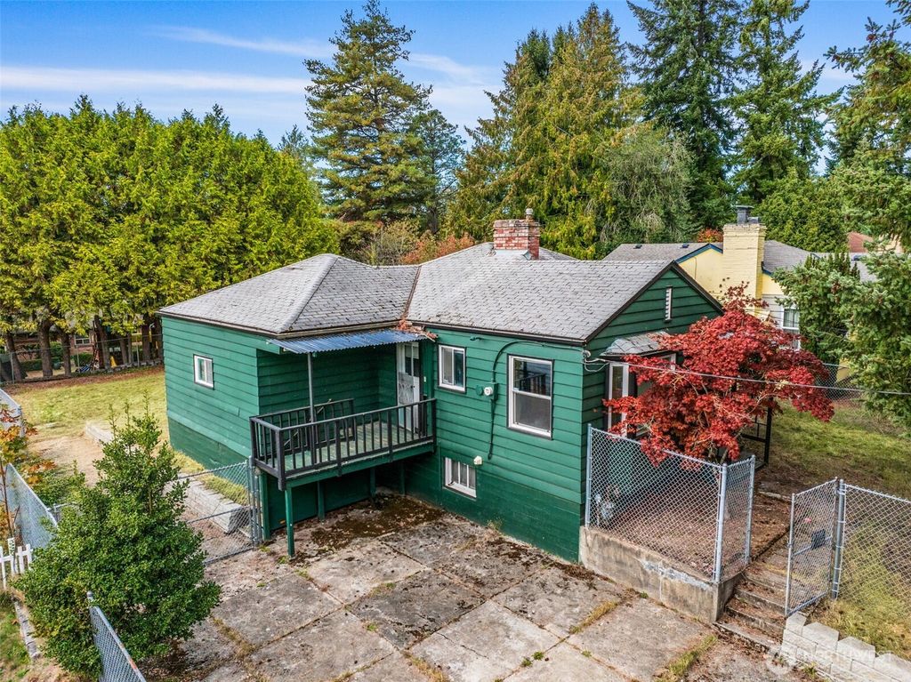 Photo of 10713 15th Ave NE Ave, Seattle, WA 98125 (MLS # 2445339)