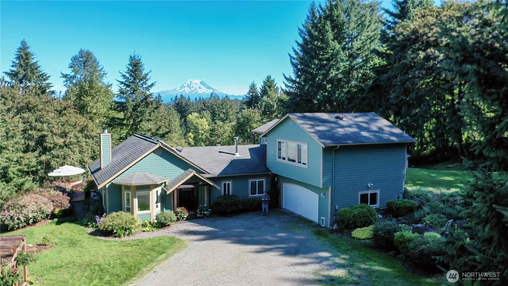 Photo of 11510 Snowcap Lane SE, Rainier, WA 98576 (MLS # 2562774)
