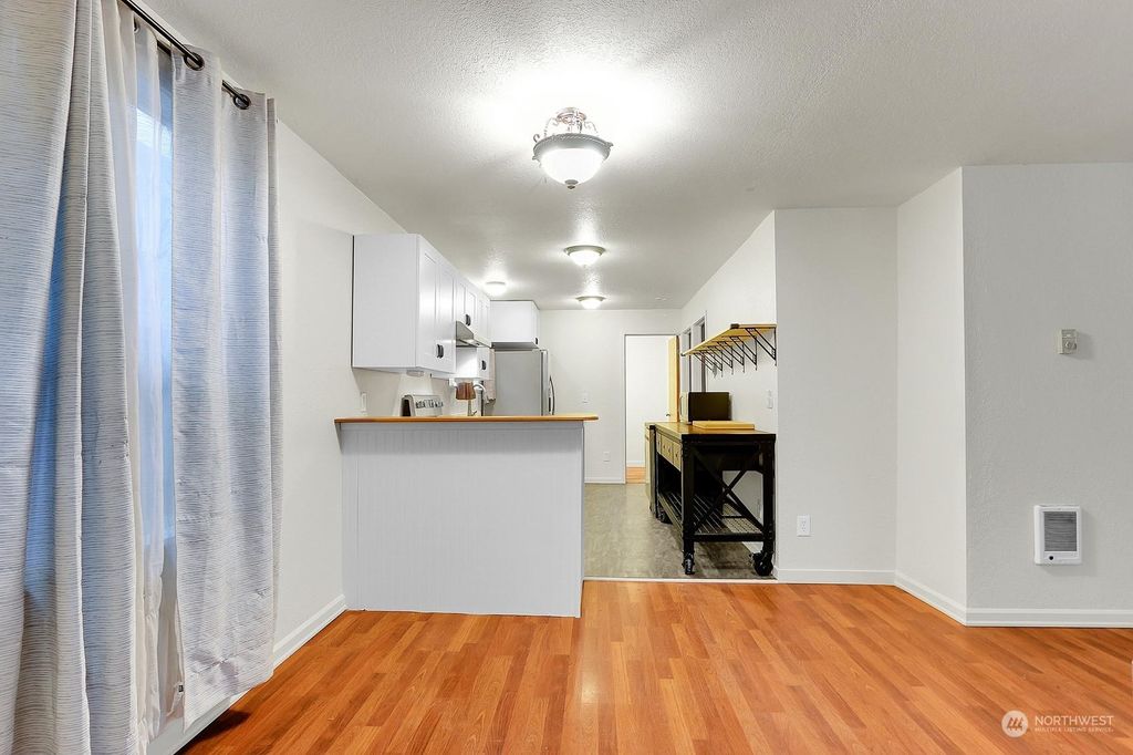 Photo of 4144 25th Avenue SW, Seattle, WA 98106 (MLS # 2177268)