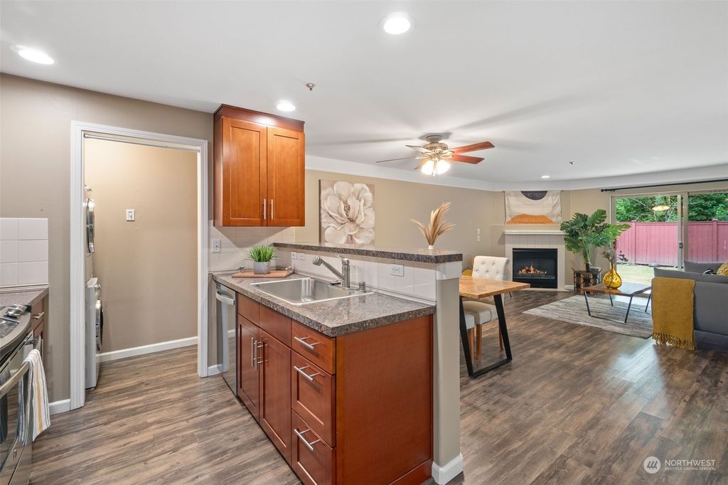Photo of 15335 Sunwood Boulevard #C103, Tukwila, WA 98188 (MLS # 2269180)