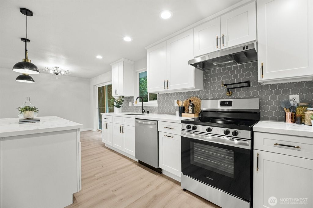 Photo of 12914 76th Avenue S, Seattle, WA 98178 (MLS # 2518393)