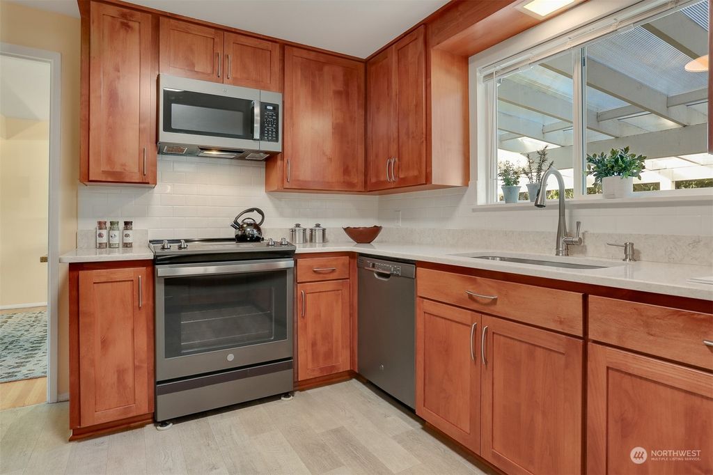 Photo of 15057 Wallingford Avenue N, Shoreline, WA 98133 (MLS # 2207143)