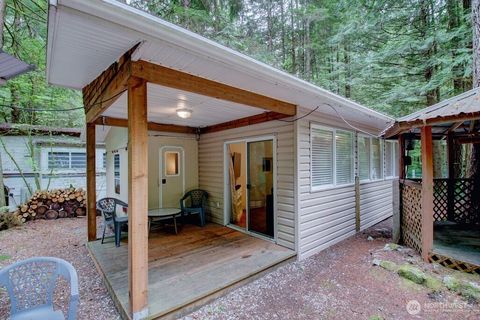 Photo of 215 Big River Boulevard E, Deming, WA 98244 (MLS # 2502380)