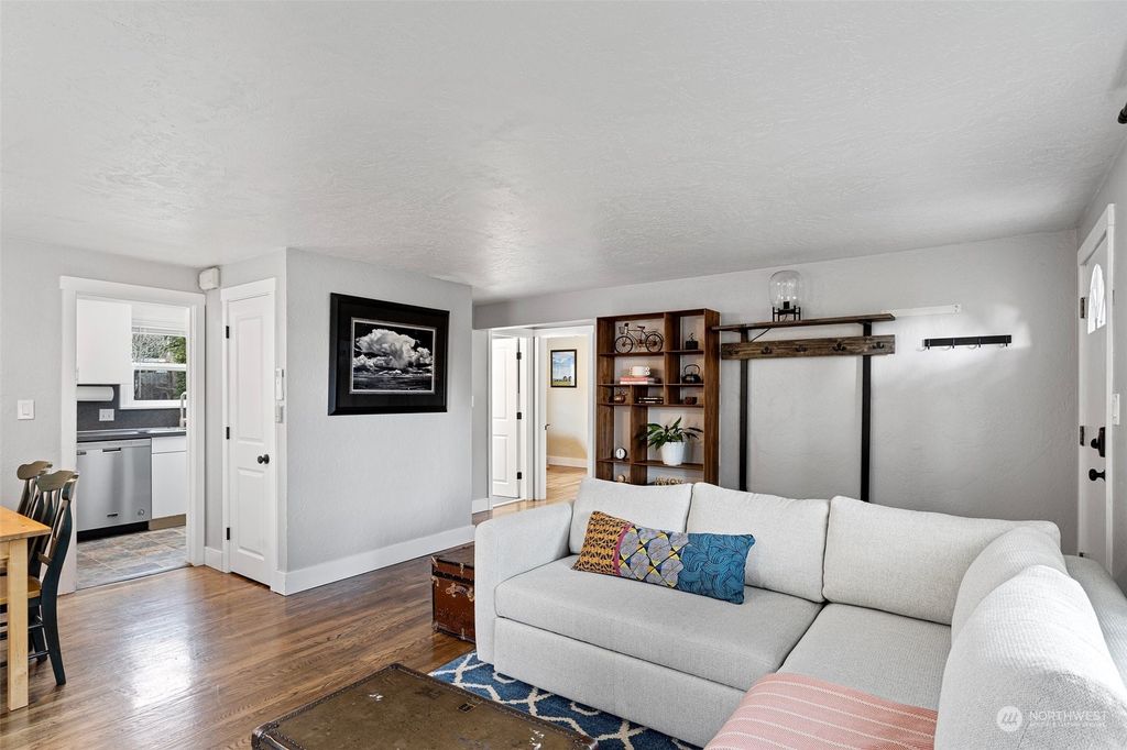 Photo of 7719 31st Avenue SW, Seattle, WA 98126 (MLS # 2037050)