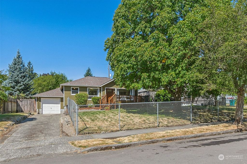 Photo of 10225 34th Avenue SW, Seattle, WA 98146 (MLS # 2265177)