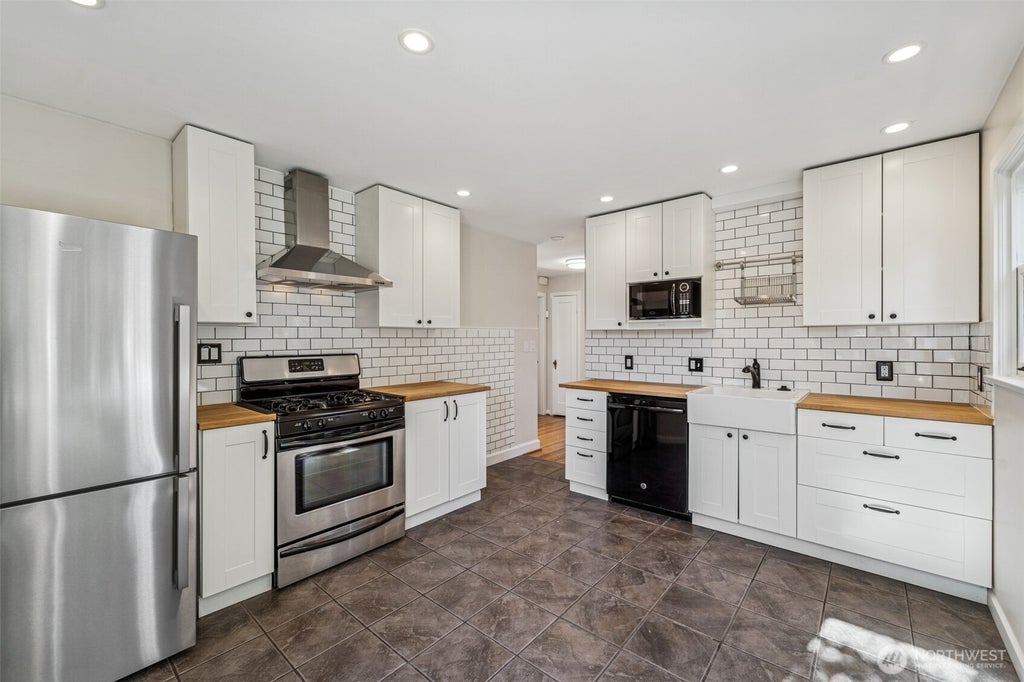 Photo of 7002 28th Avenue NW, Seattle, WA 98117 (MLS # 2572491)