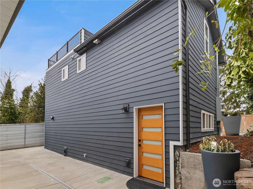 Photo of 7750 14th Avenue SW, Seattle, WA 98106 (MLS # 2335150)