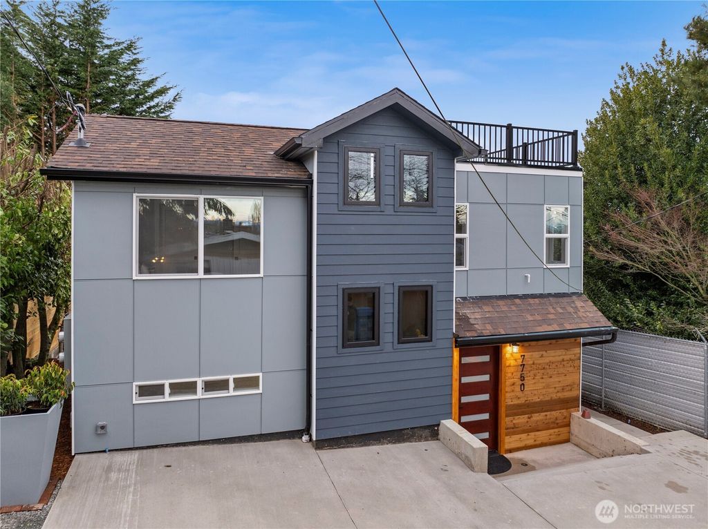 Photo of 7750 14th Avenue SW, Seattle, WA 98106 (MLS # 2335150)
