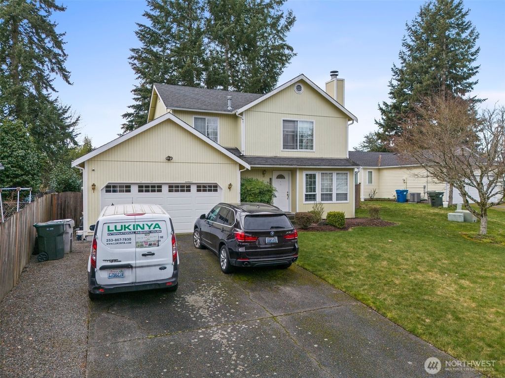 Photo of 22125 112th Place SE, Kent, WA 98031 (MLS # 2336871)