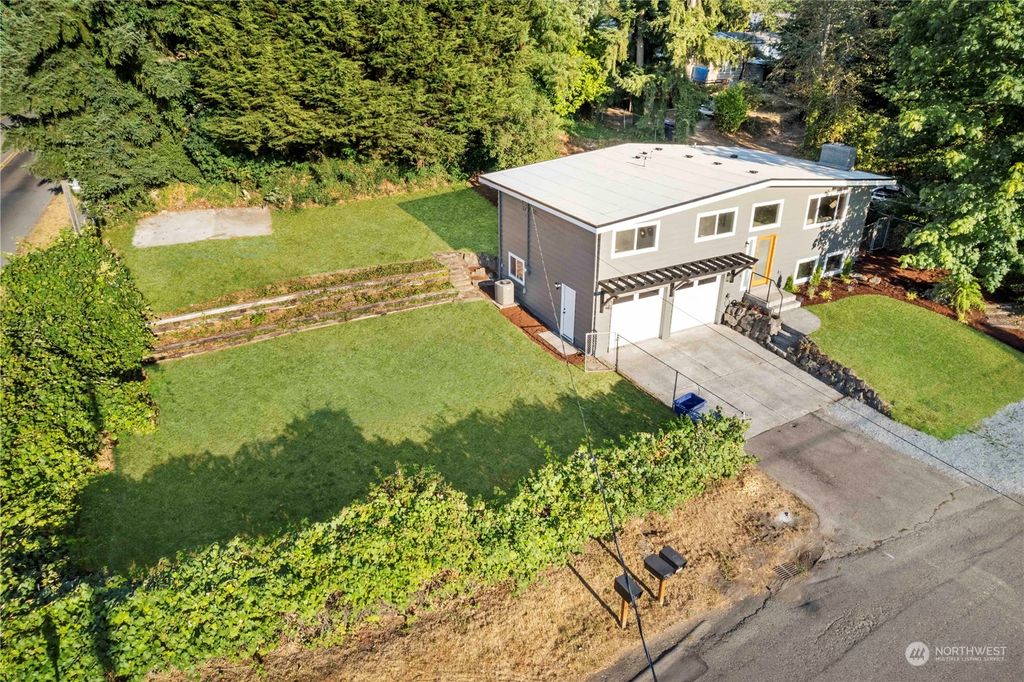 Photo of 10704 25th Avenue SW, Seattle, WA 98146 (MLS # 2152414)