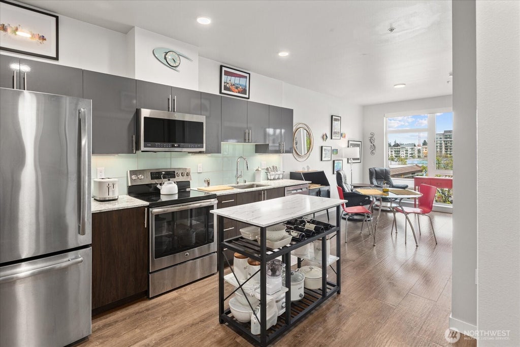 Photo of 1085 103rd Avenue NE #311, Bellevue, WA 98004 (MLS # 2549910)