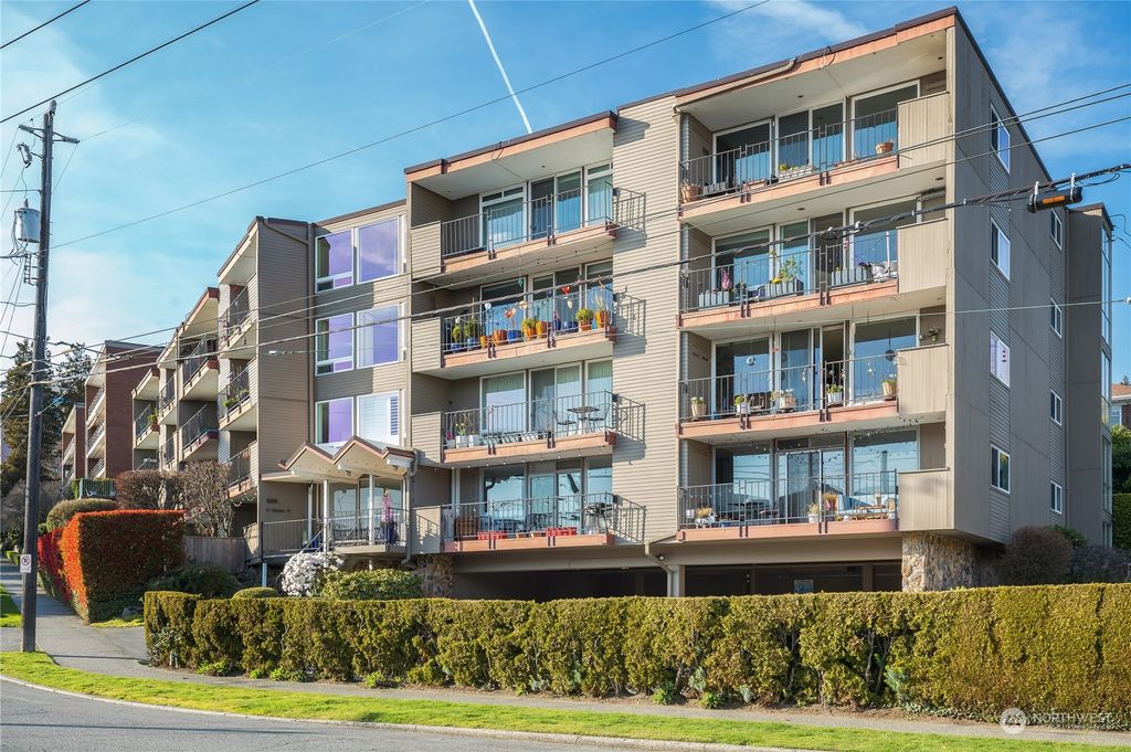 Photo of 500 W Olympic Place #103, Seattle, WA 98119 (MLS # 2047400)
