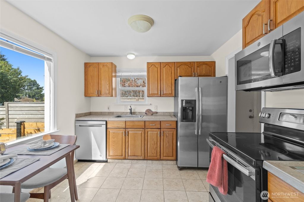 Photo of 9226 21st Avenue SW, Seattle, WA 98106 (MLS # 2421644)