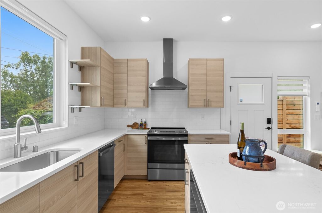 Photo of 9228 21st Avenue SW, Seattle, WA 98106 (MLS # 2398317)