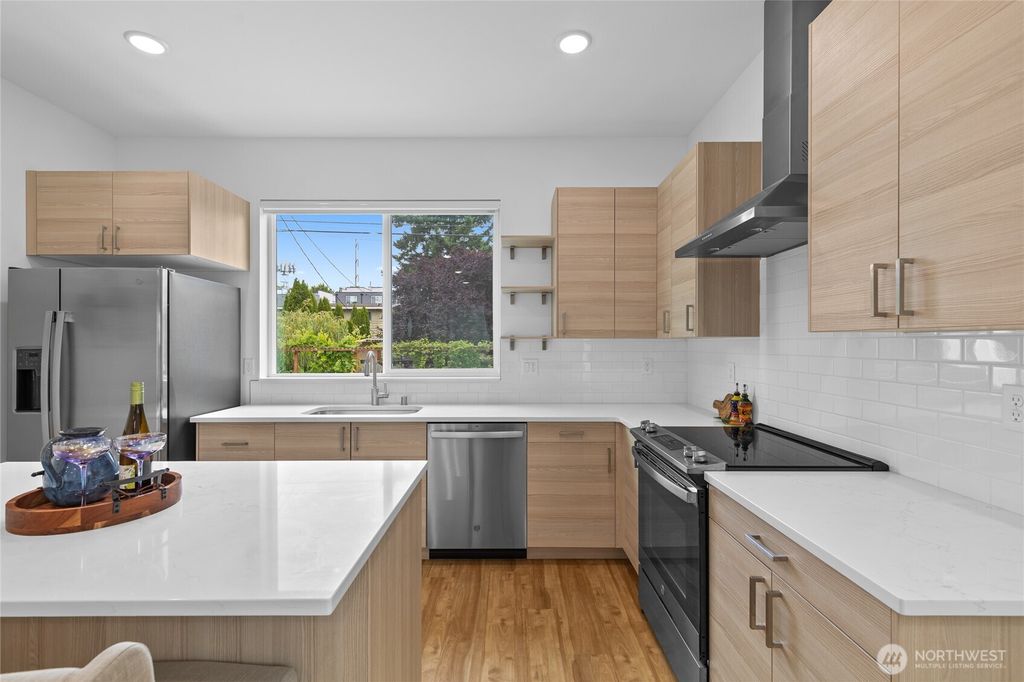 Photo of 9228 21st Avenue SW, Seattle, WA 98106 (MLS # 2398317)