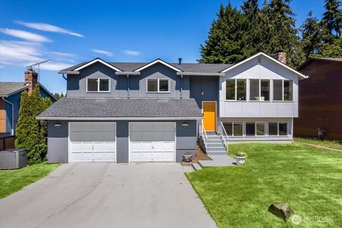 Photo of 2802 NE 23rd Place, Renton, WA 98056 (MLS # 2491860)
