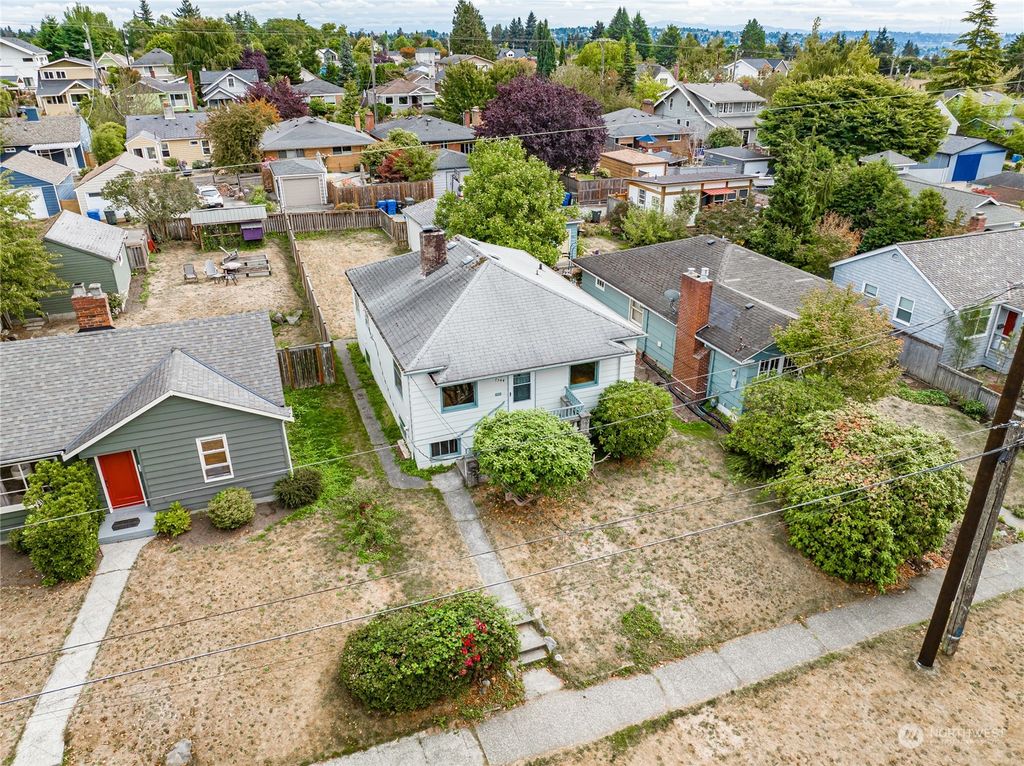 Photo of 7544 29th Avenue NW, Seattle, WA 98117 (MLS # 2159276)