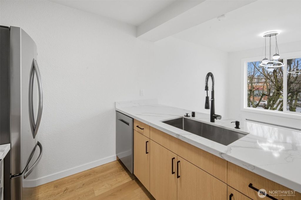 Photo of 3233 NE 12th Street #201, Renton, WA 98056 (MLS # 2488811)