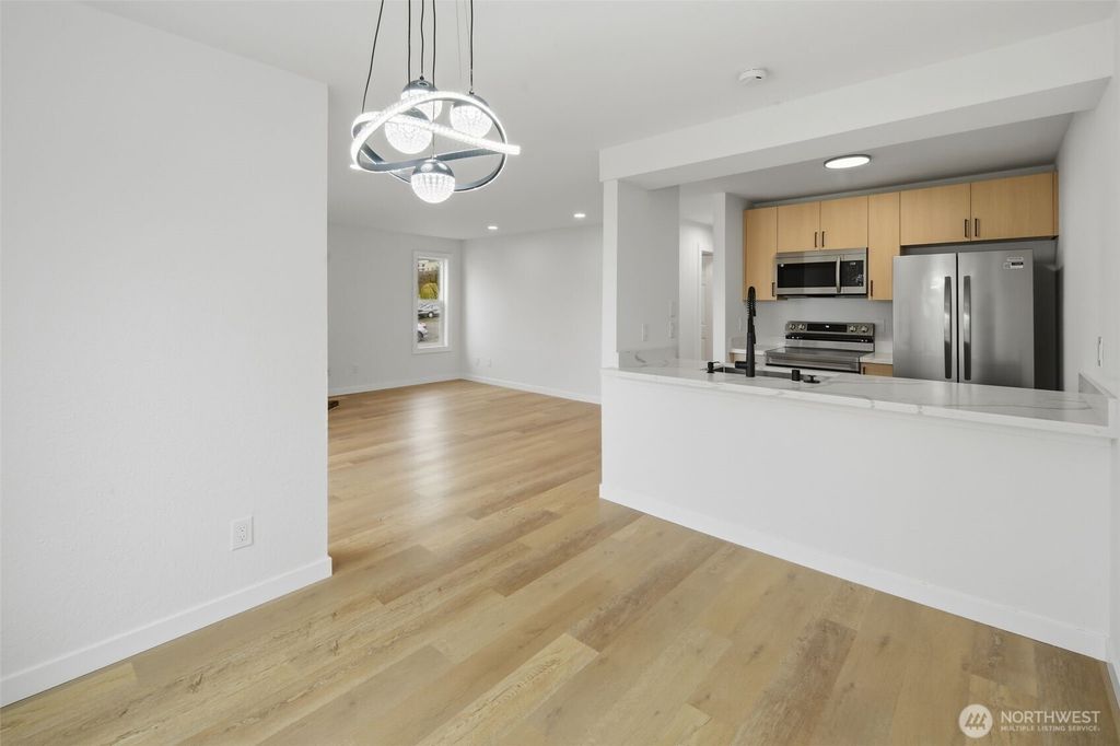 Photo of 3233 NE 12th Street #201, Renton, WA 98056 (MLS # 2488811)