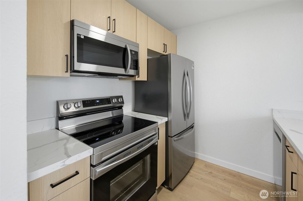 Photo of 3233 NE 12th Street #201, Renton, WA 98056 (MLS # 2488811)