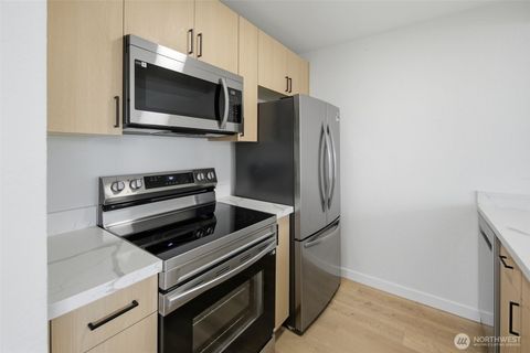 Photo of 3233 NE 12th Street #201, Renton, WA 98056 (MLS # 2488811)