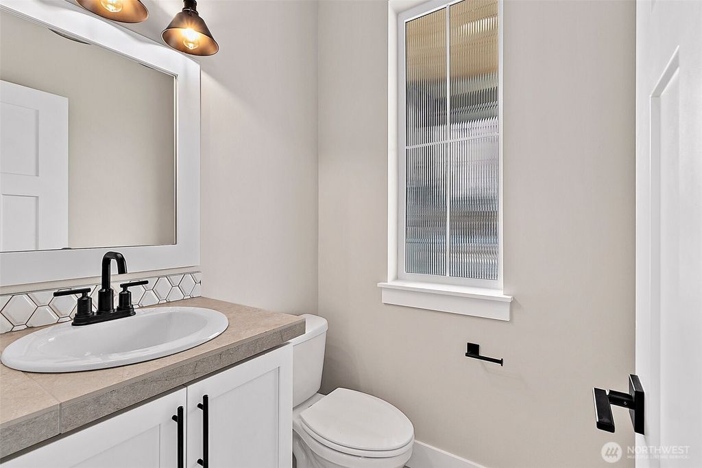 Photo of 20825 99th Place S, Kent, WA 98031 (MLS # 2444580)