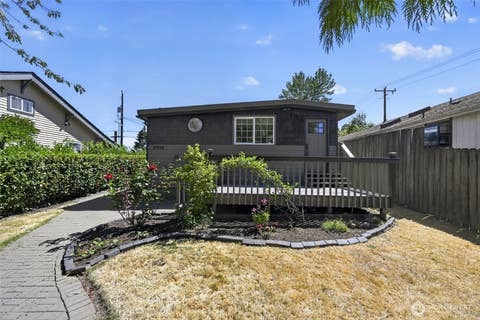 Photo of 7768 14th Avenue SW, Seattle, WA 98106 (MLS # 2564905)