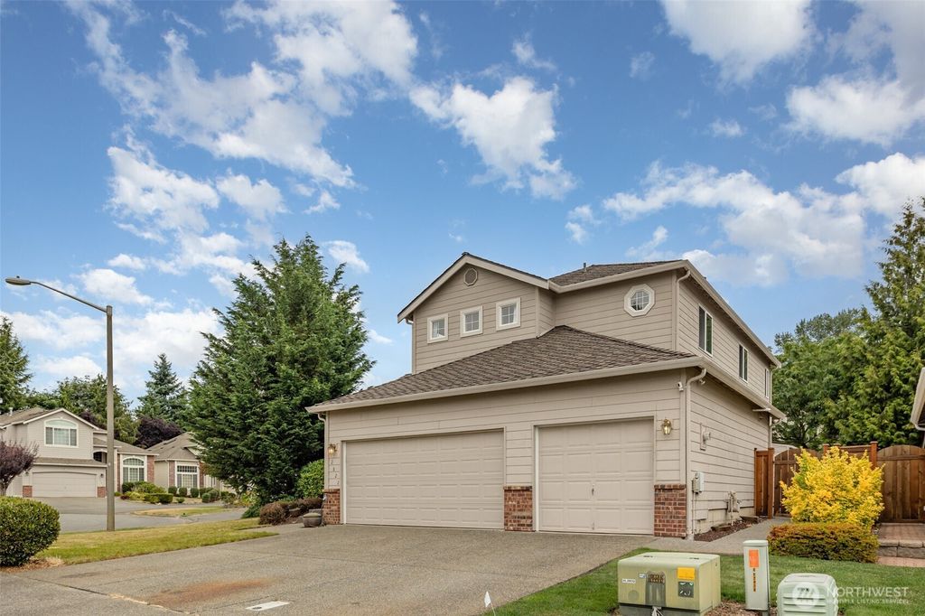 Photo of 12822 SE 223rd Place Pl, Kent, WA 98031 (MLS # 2414134)