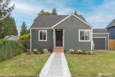 Photo of 910 E MAIN Street, Auburn, WA 98002 (MLS # 2569947)