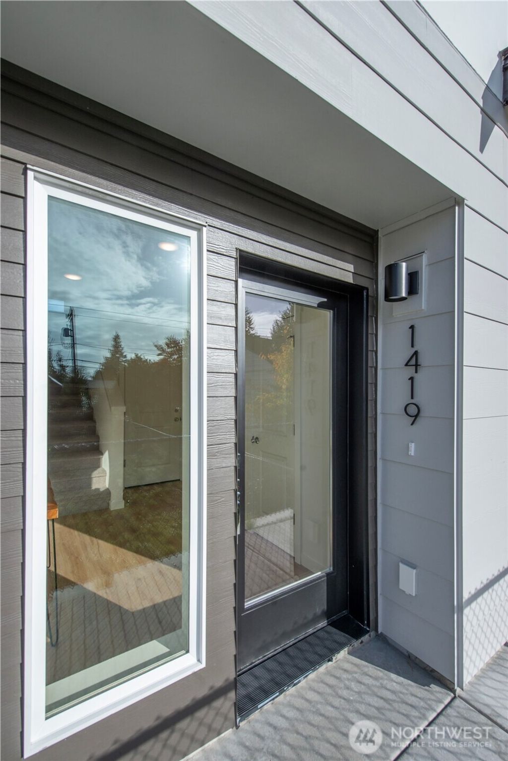 Photo of 1419 SW 111th Lane, Seattle, WA 98164 (MLS # 2431255)