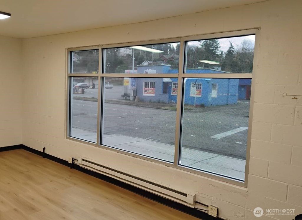 Photo of 209 E Gowe Street, Kent, WA 98032 (MLS # 2462915)