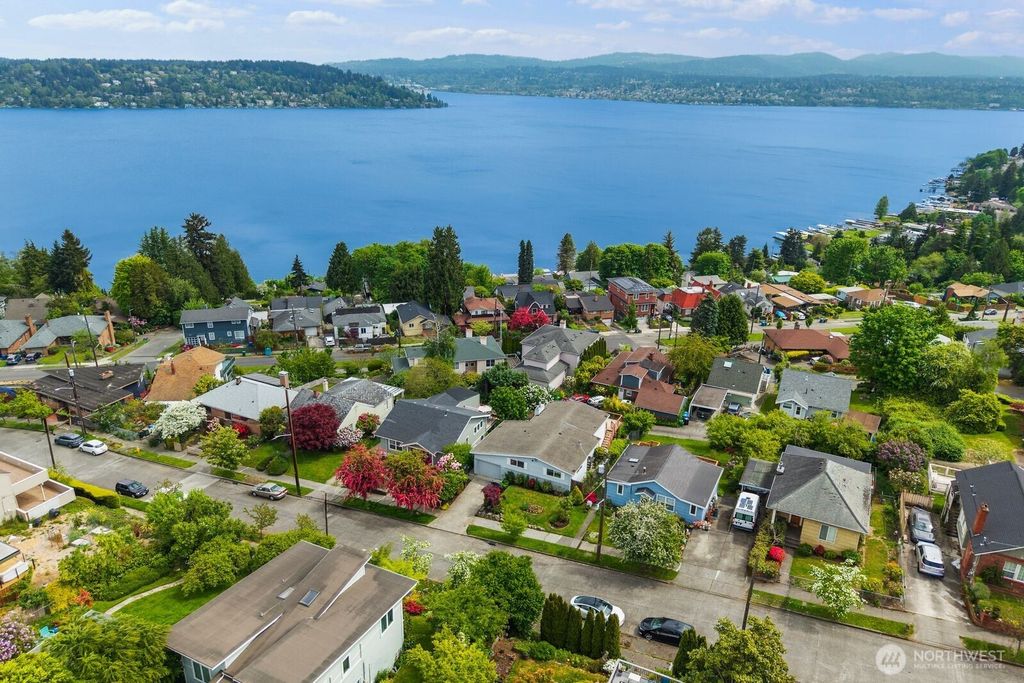 Photo of 9818 63rd Avenue S, Seattle, WA 98118 (MLS # 2499699)